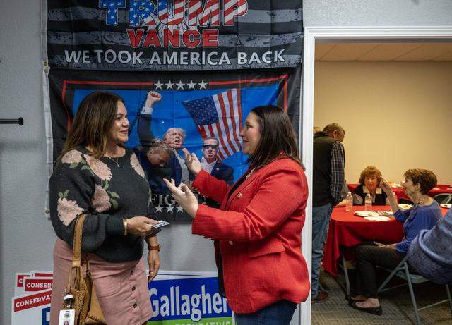 Sutter County Assessor Kathy Scriven, left, meets with Ashley Carr, chair of the Sutter County Republican Central Committee, at the opening of the Sutter County GOP headquarters in Yuba City on March 5.