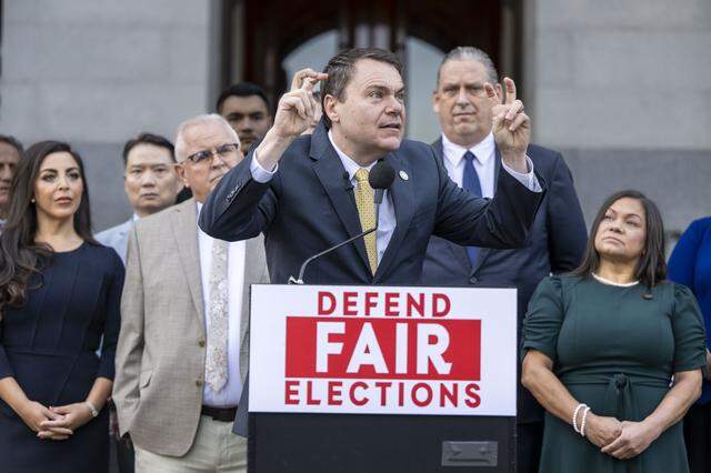 Assemblymember Carl DeMaio, pictured at a rally last year, is behind efforts to require voter ID at the polls and another measure that seeks to punish lawmakers who voted for mid-decade redistricting. 