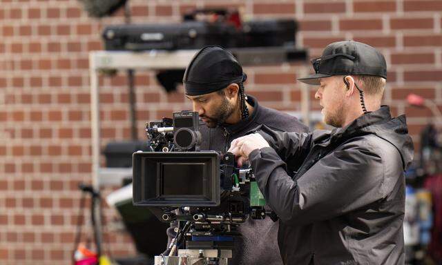 Crew members prepare a camera for a scene in Paul Thomas Anderson’s film “One Battle After Another” in Sacramento on Feb. 6, 2024.