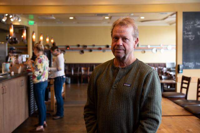 OneSpeed chef and owner Rick Mahan stands in OneSpeed’s dining room in 2020.