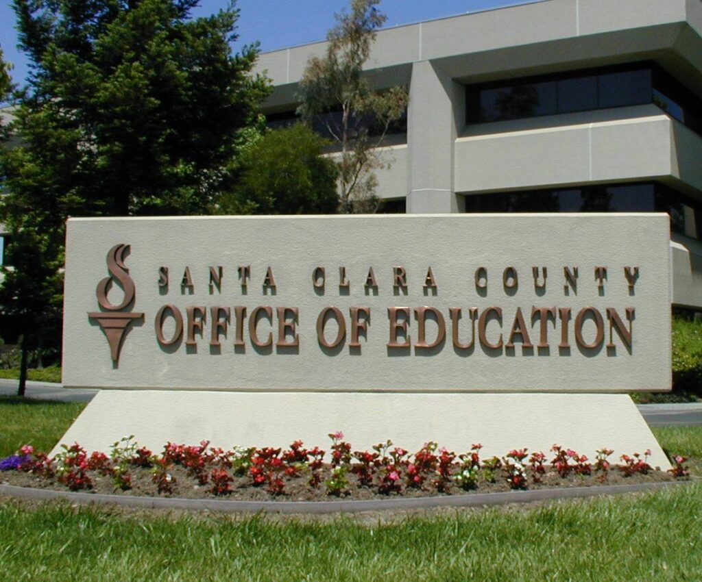 A sign for a county office of education