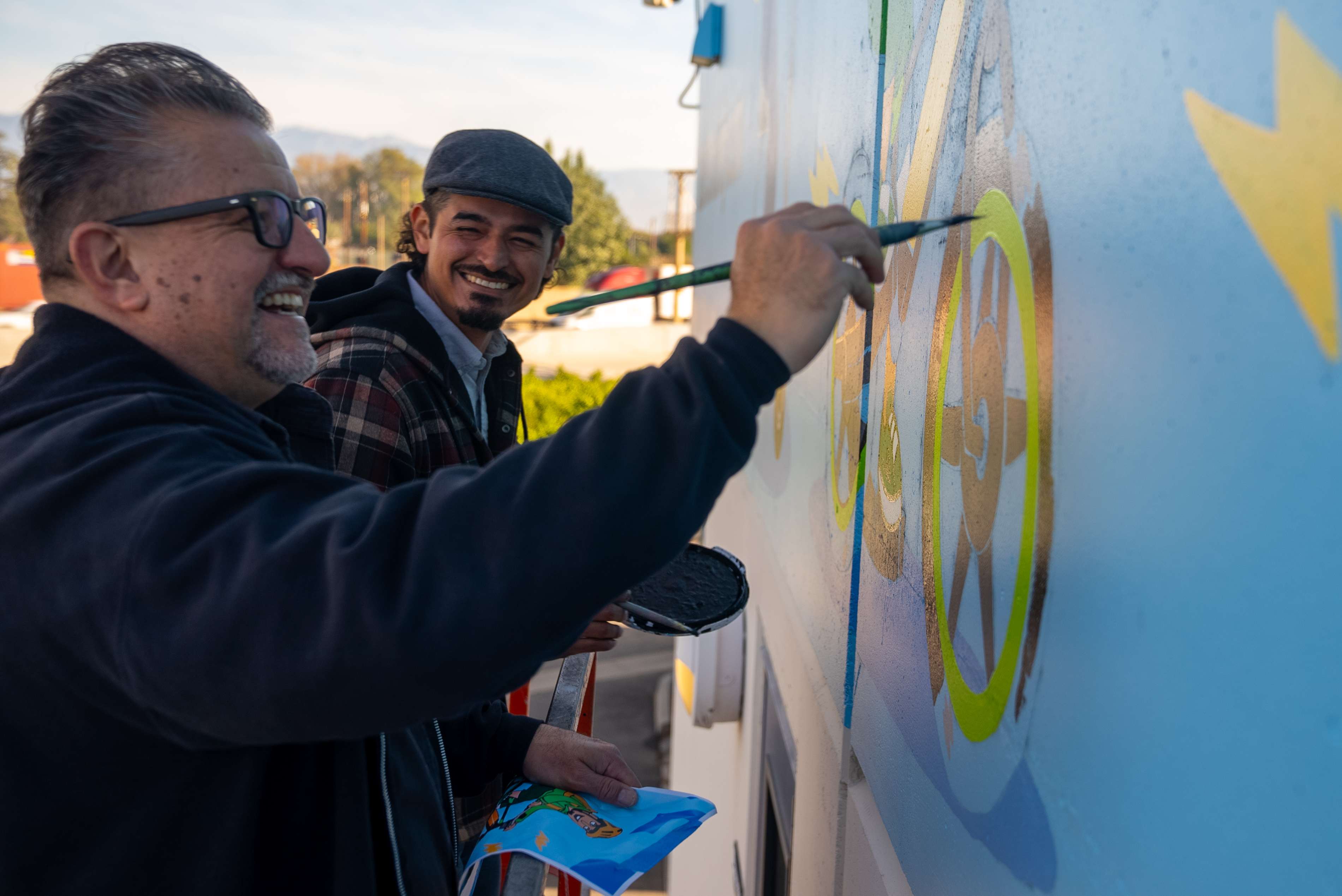 From concept to unveiling, it took artists Lalo Alcaraz, left,...