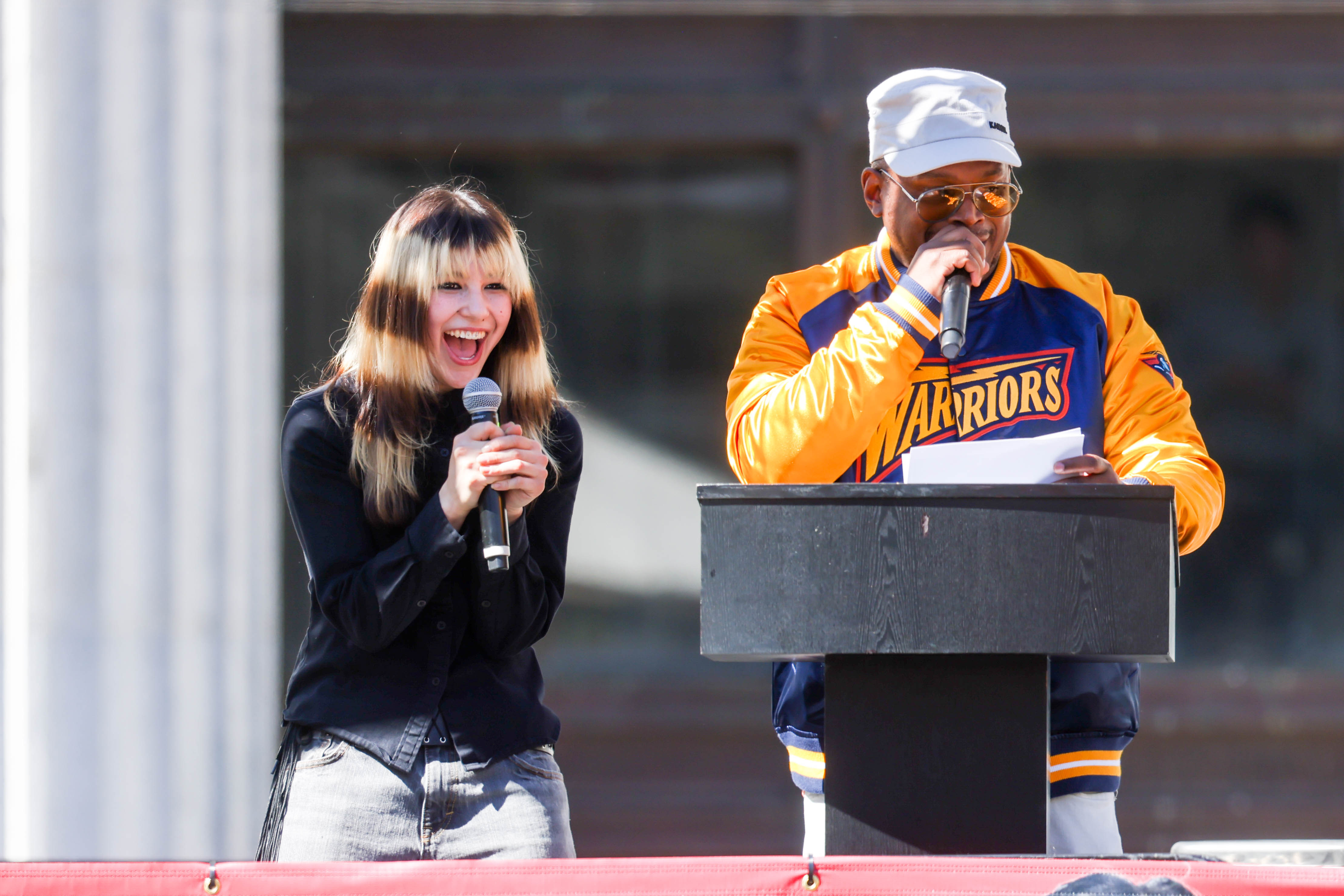 Olympic gold medalist figure skater Alysa Liu, left, reacts during...