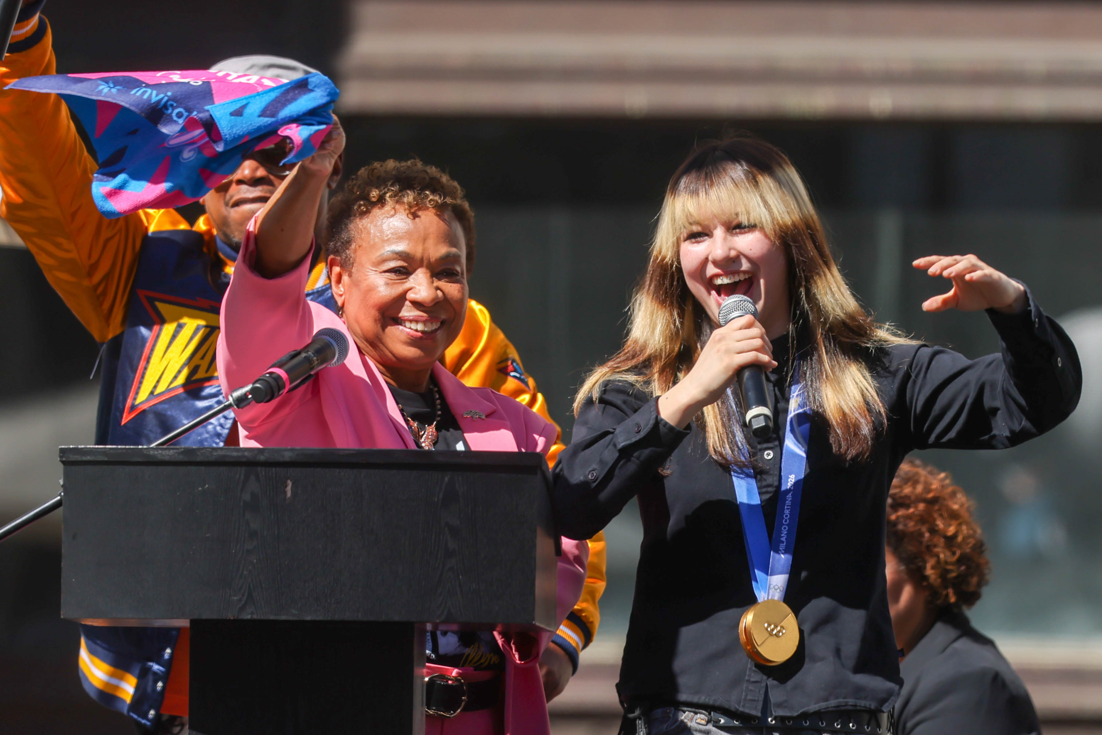 Oakland Mayor Barbara Lee waves a towel rally before presenting...