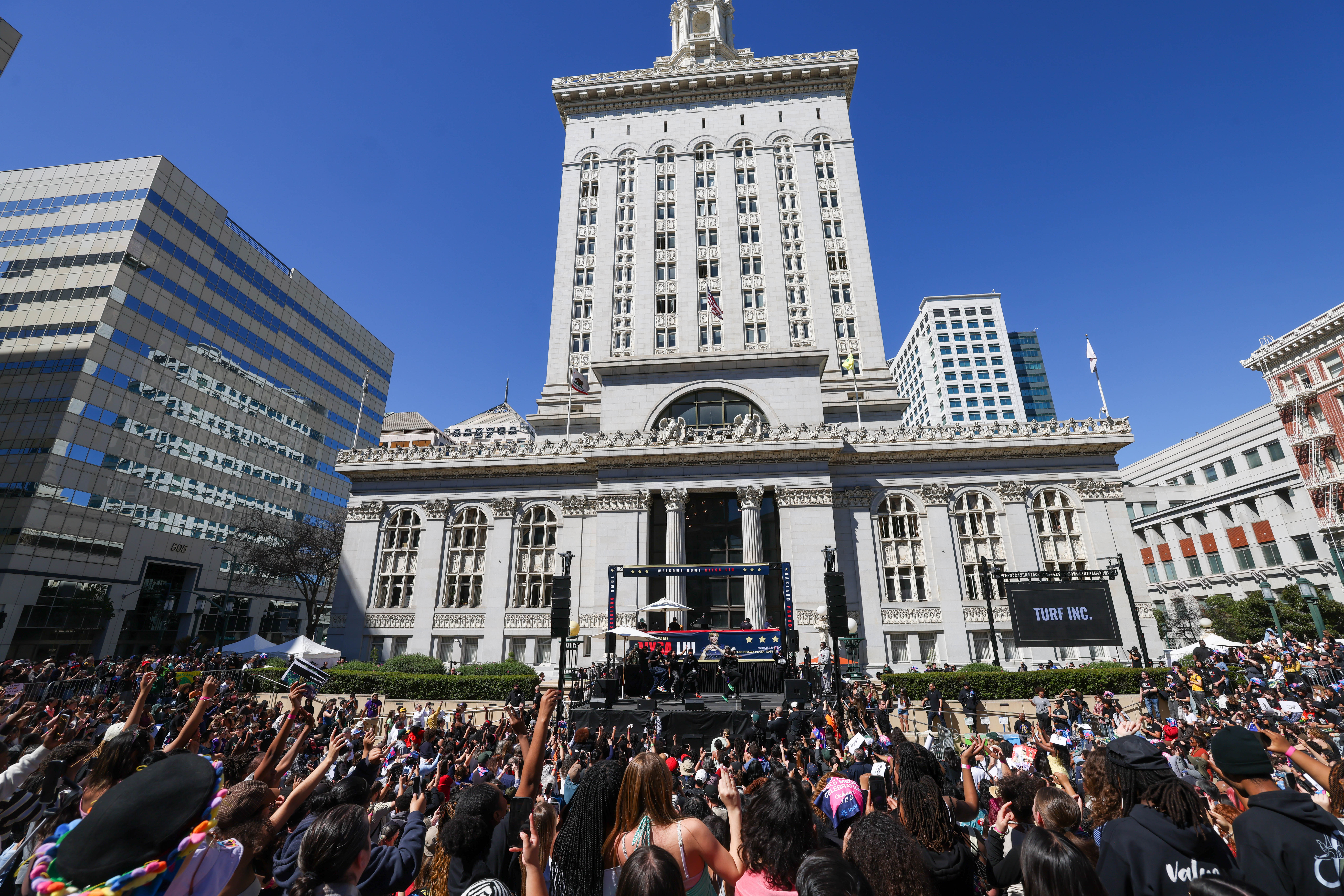 Attendees cheer during Alysa Liuâs celebration rally at Frank Ogawa...