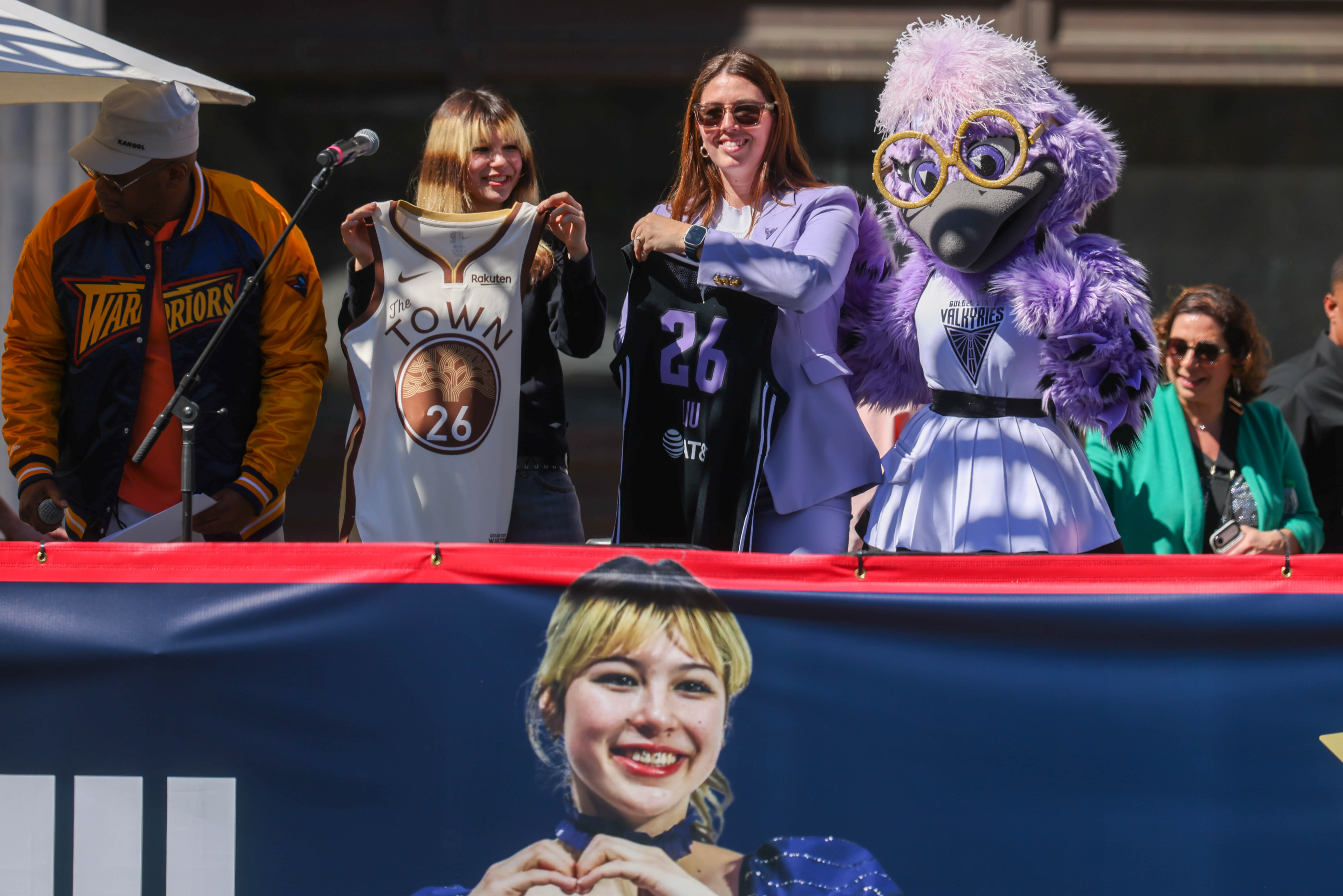 Golden State Valkyries president Jess Smith, center, and mascot Violet...
