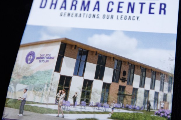 A pamphlet shows a rendering of the Dharma Center which will house a preschool, Sunday religious classes, a Japanese language school, and other San Jose Buddhist Church Betsuin and community activities. (Dai Sugano/Bay Area News Group)