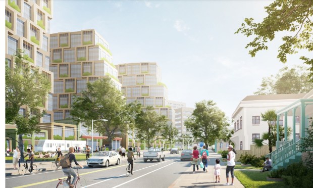 San Fernando Street area of Google's proposed Downtown West transit-oriented neighborhood in downtown San Jose, showing buildings in the project near a light rail line and existing building, concept. 