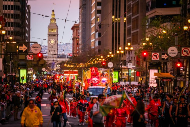 A large crowd watches the Chinese New Year Parade celebrating the Year of the Horse along Market Street in San Francisco, Calif., on Saturday, March 7, 2026. (Ray Chavez/Bay Area News Group)