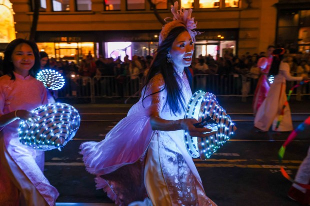 Participants march along Market Street during the Chinese New Year Parade, celebrating the Year of the Horse, in San Francisco, Calif., on Saturday, March 7, 2026. (Ray Chavez/Bay Area News Group)