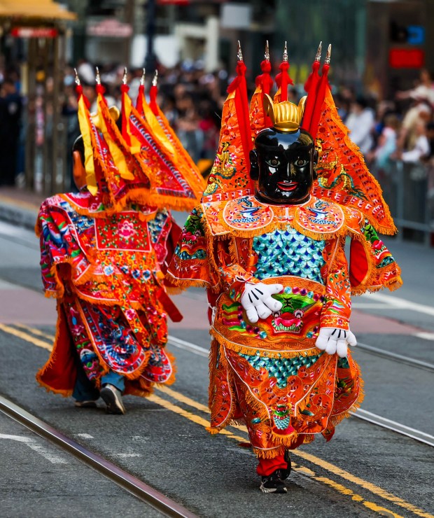 Participants march along Market Street during the Chinese New Year Parade, celebrating the Year of the Horse, in San Francisco, Calif., on Saturday, March 7, 2026. (Ray Chavez/Bay Area News Group)