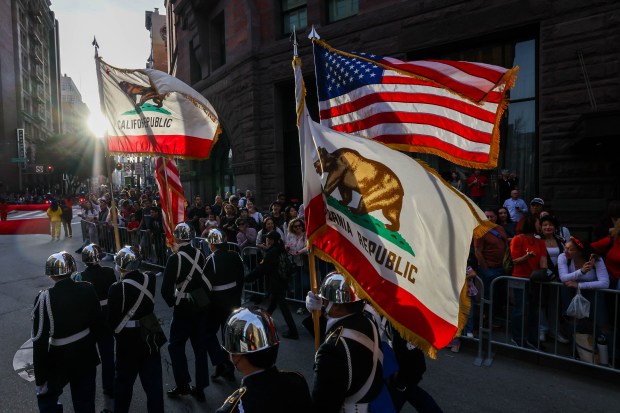 A color guard leads the Chinese New Year Parade, celebrating the Year of the Horse, in San Francisco, Calif., on Saturday, March 7, 2026. (Ray Chavez/Bay Area News Group)