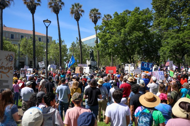 People gather during a No Kings protest at St. James Park in downtown San Jose, Calif., on Saturday, March 28, 2026. (Shae Hammond/Bay Area News Group)