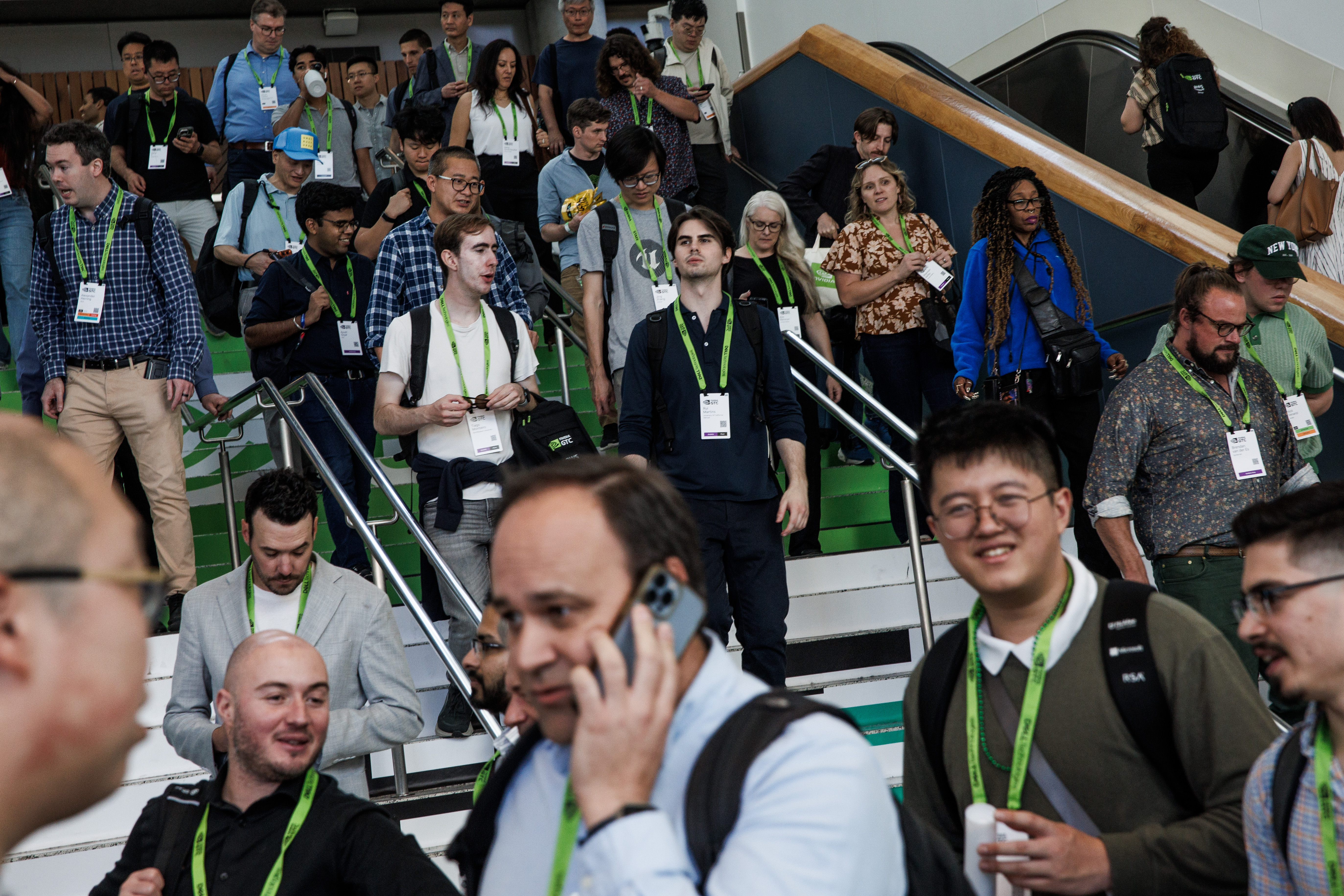 People attend the Nvidia GTC 2026 conference at the San...