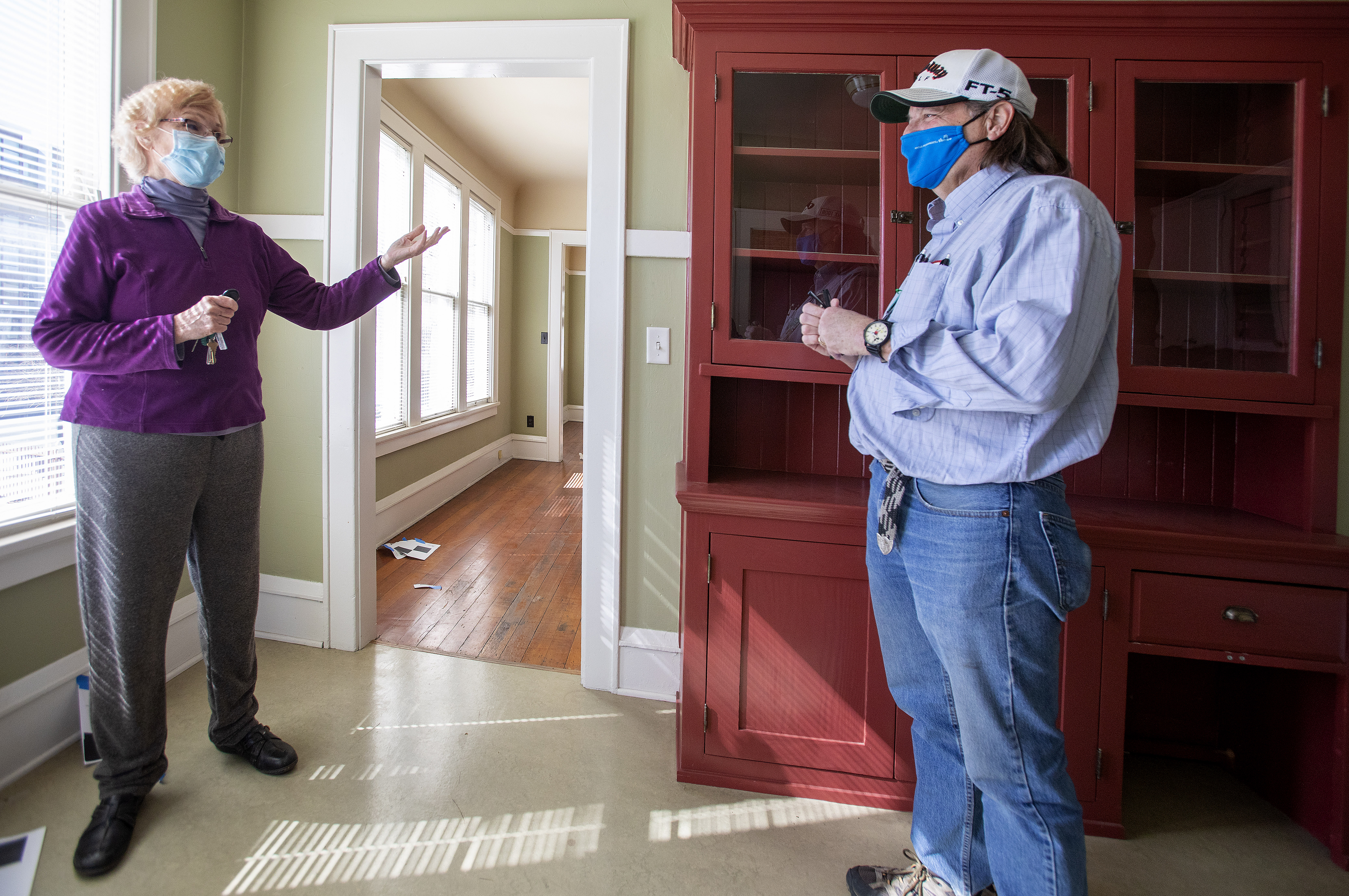 Standing inside a unit of the Pallesen apartment building, Sunday,...
