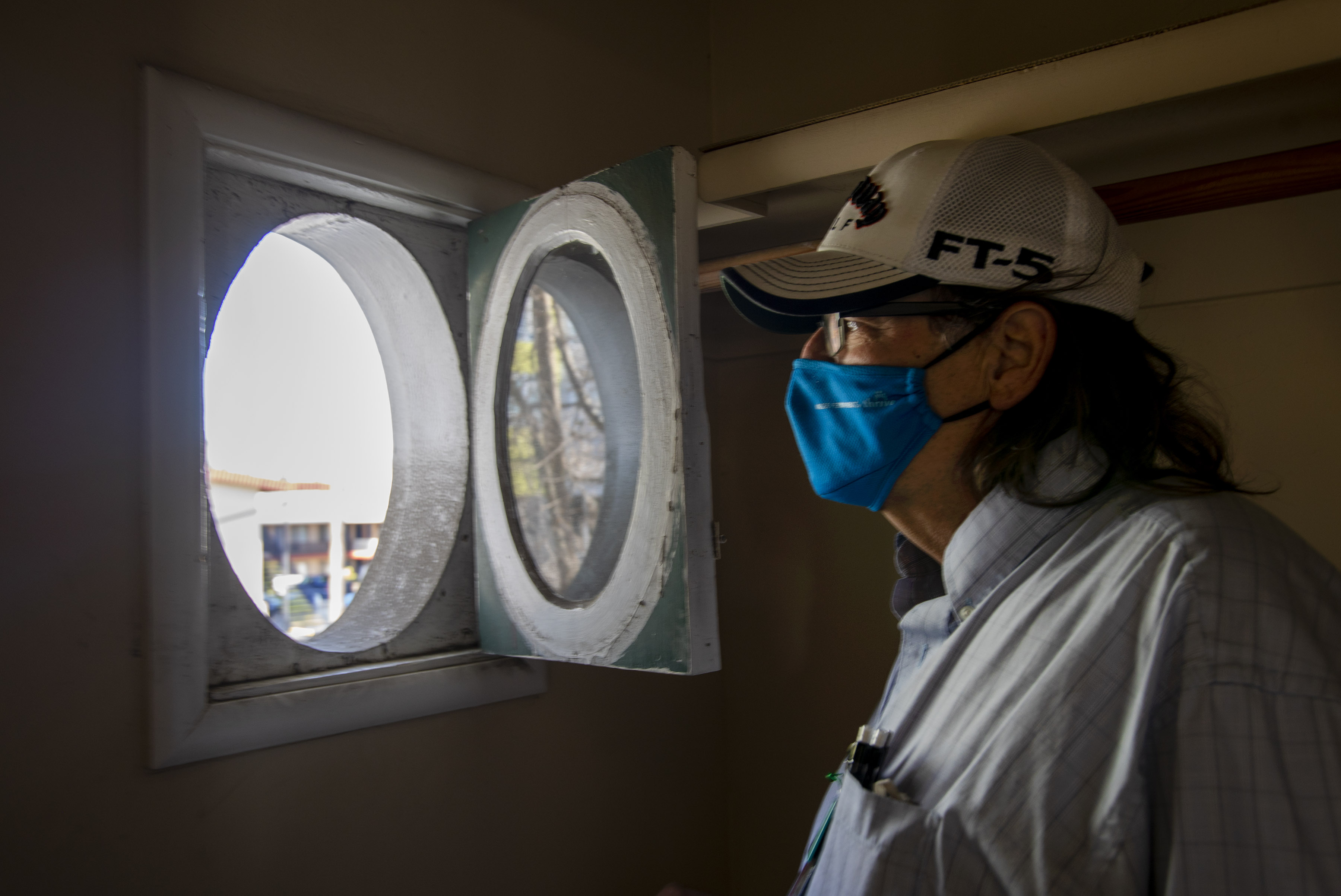 Mike Sodergren of San Jose's Preservation Action Council peers out...