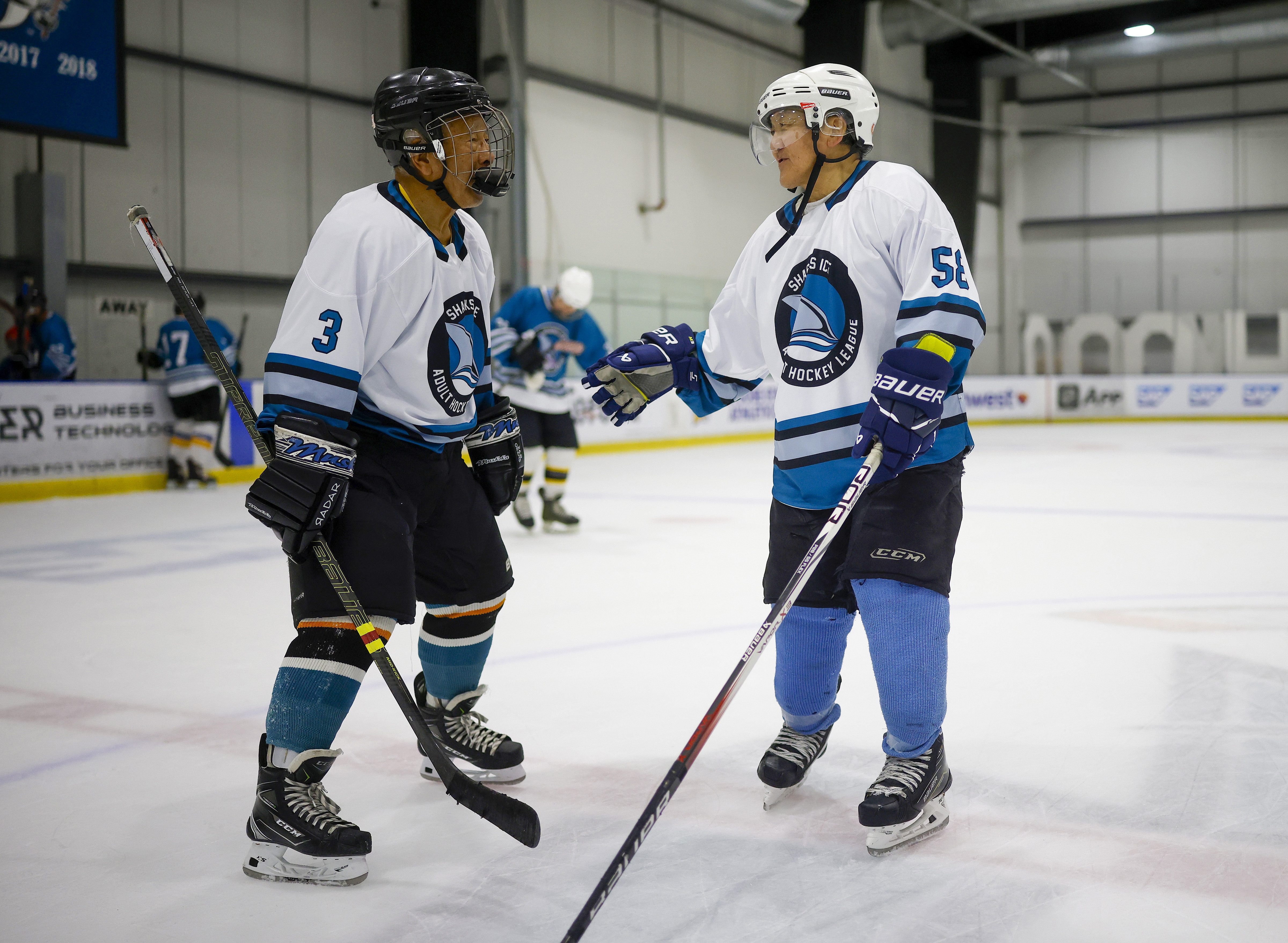 Ed Asato (3), left, 87, from Sunnyvale, chats with Ted...
