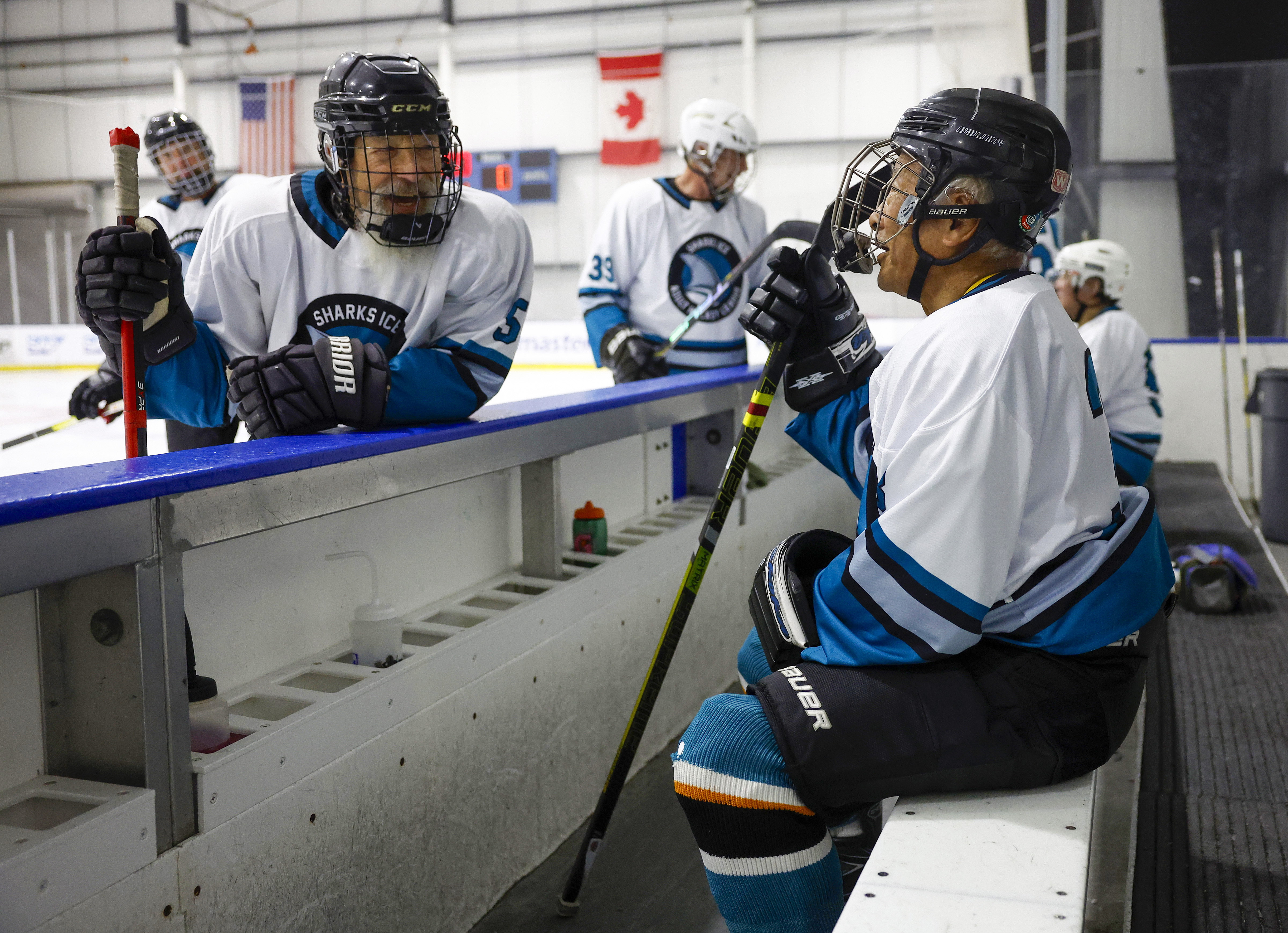 Peter Fediay, left, from Santa Cruz, chats with Ed Asato...