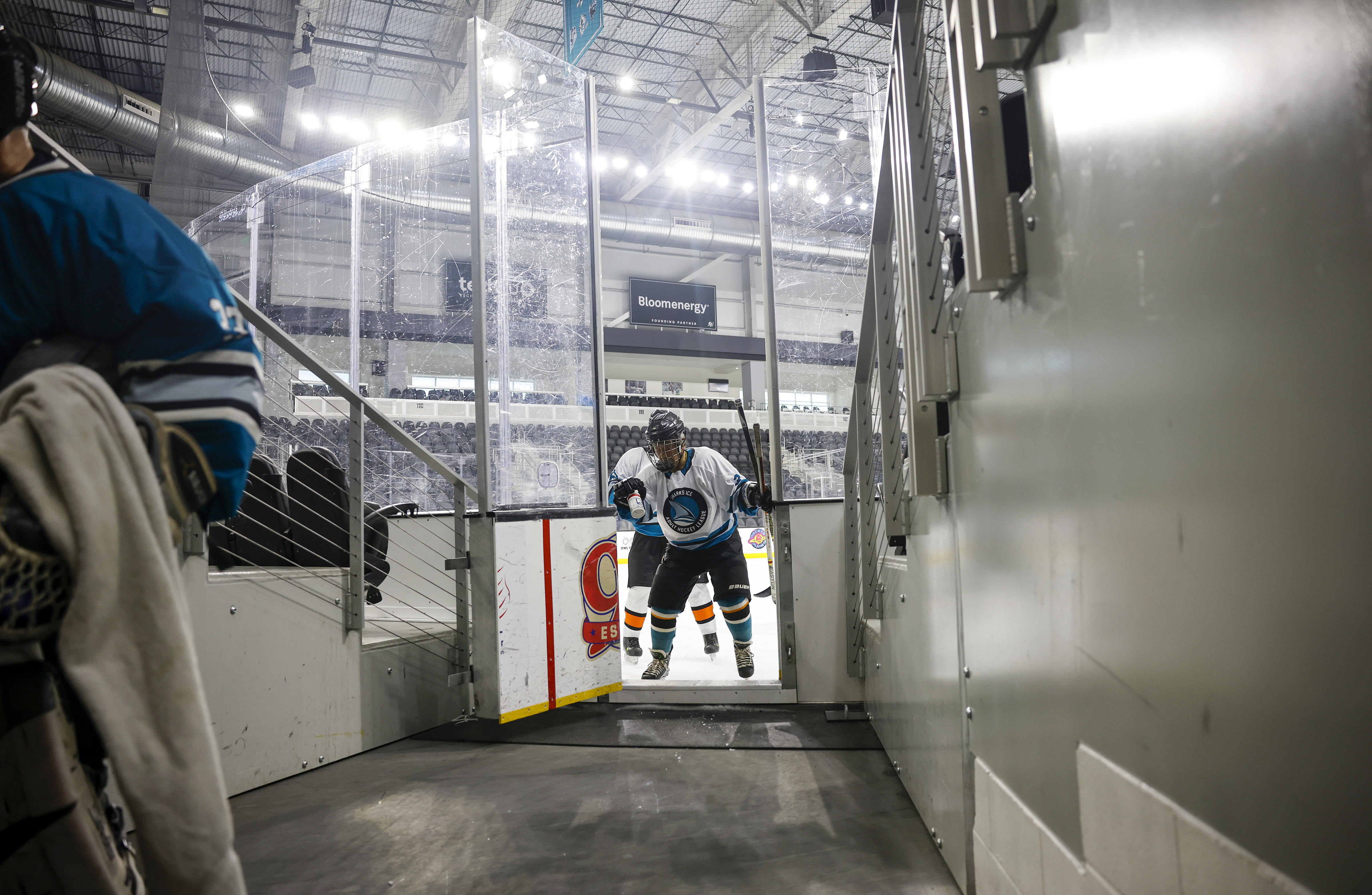 Ed Asato (3), 87, from Sunnyvale, heads off the ice...