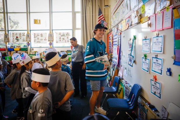 San Jose Sharks' Will Smith reads to students at Bachrodt Elementary in San Jose, Calif., on Thursday, March 5, 2026. (Shae Hammond/Bay Area News Group)