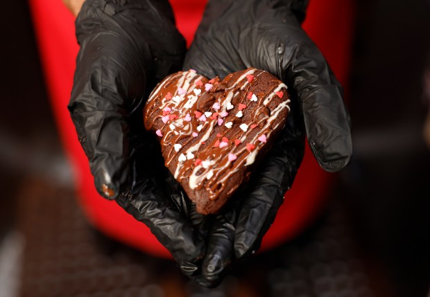 Andrea Lacy, owner and baker at Luv's Brownies, holds a brownie in her food truck in San Jose, Calif., on Monday, March 2, 2026. (Nhat V. Meyer/Bay Area News Group)