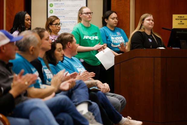 Heidi Williams, far right, president of Women of Water Employee Recourse Group, speaks in a packed board room during public comment against ex-CEO Rick Callender at the Santa Clara Valley Water District board meeting at the Water District headquarters in San Jose, Calif., on Tuesday, March 10, 2026. Last week the board voted to pay its departing CEO $520,000 to resign and continue working as a "special advisor" for another year following an investigation that found he sexually harassed staff members. (Nhat V. Meyer/Bay Area News Group)