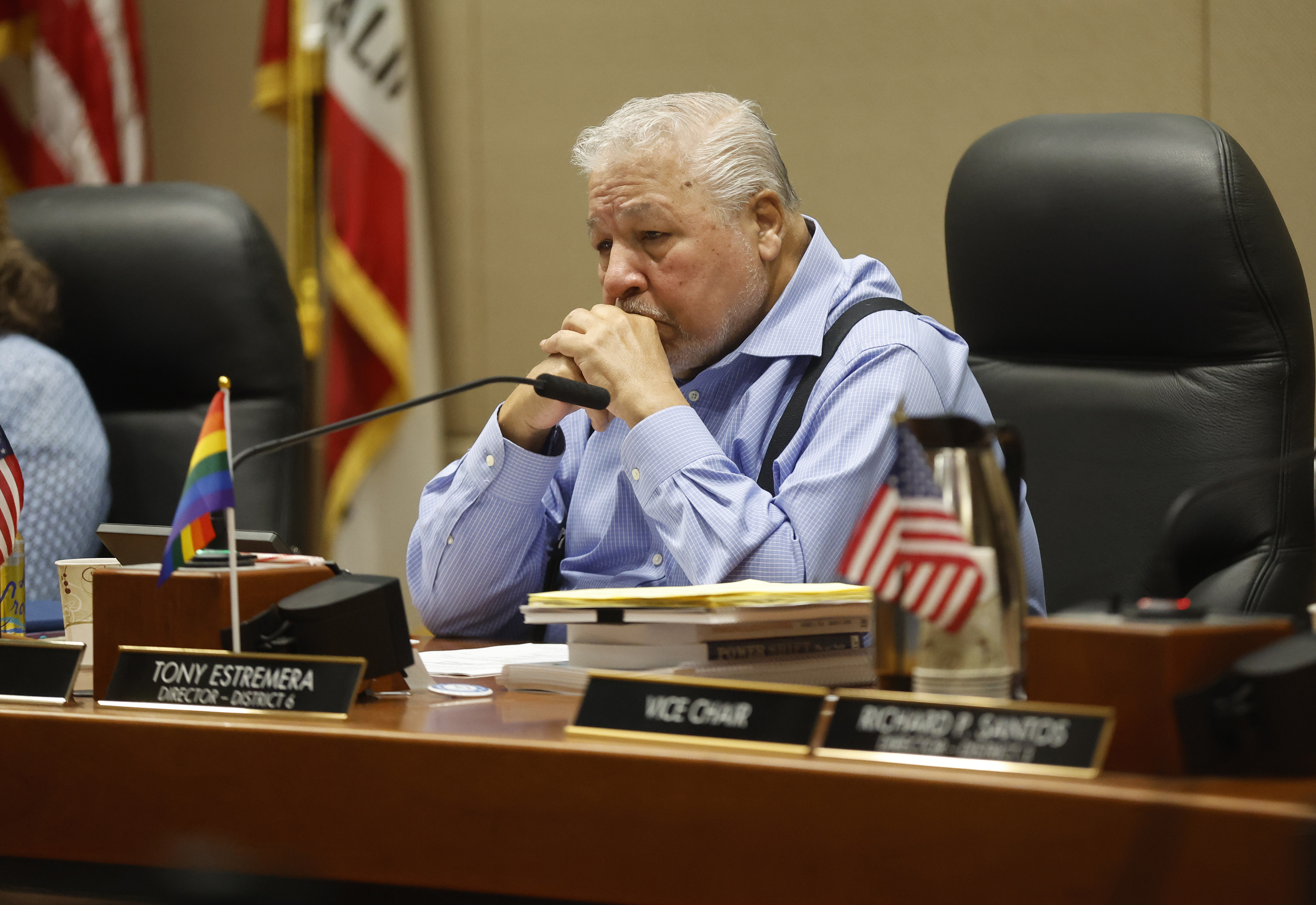 Santa Clara Valley Water District board chair Tony Estremera listens...