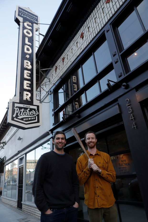 Co-owners and former Williams College baseball pitchers Wilson Barr and Tommy Hester, from left, are photographed at Two Pitchers Brewing Company in Oakland, Calif., on Wednesday, Feb. 9, 2022. (Jane Tyska/Bay Area News Group)