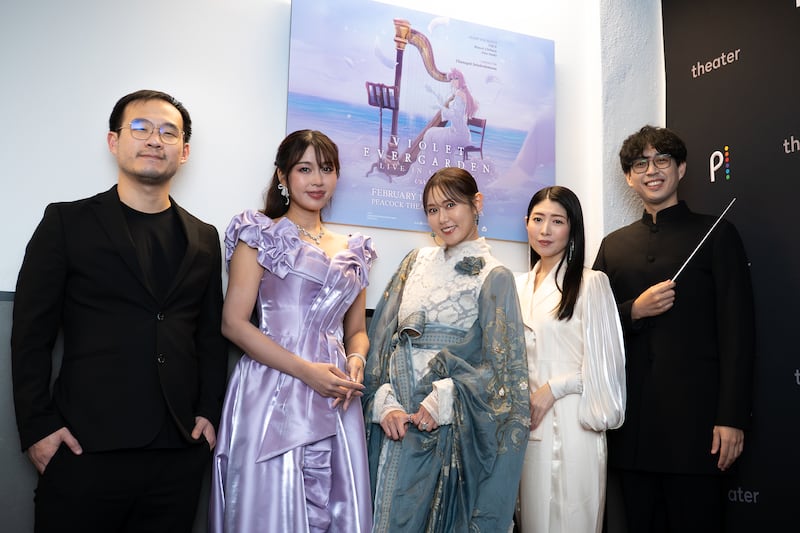 Performers taking a group photo