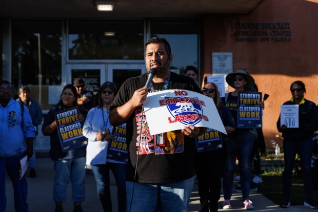 Richard Gijon, second vice president of CSEA Chapter 788, speaks to supporters and members of the media ahead of a school board meeting at the San Diego Unified School District headquarters on Tuesday, March 3, 2026. (Kristian Carreon / The San Diego Union-Tribune)
