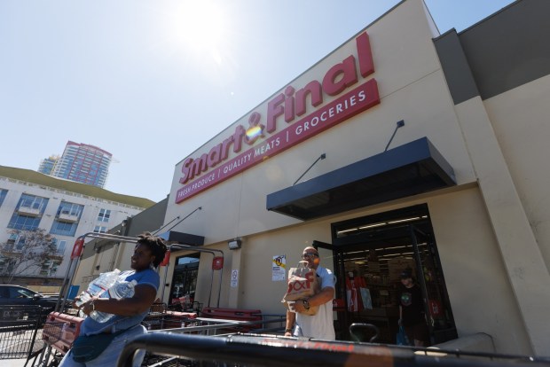 Shoppers leave Smart & Final in downtown San Diego on Thursday, March 12, 2026. (Kristian Carreon / The San Diego Union-Tribune)