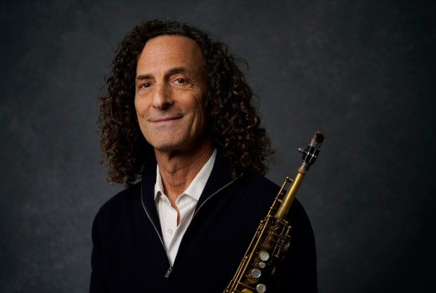 Saxophonist Kenny G poses for a portrait in Los Angeles to promote his album of lullabies titled "Innocence," on Wednesday, Nov. 1, 2023. He'll perform in San Diego on Friday. (AP Photo/Chris Pizzello)