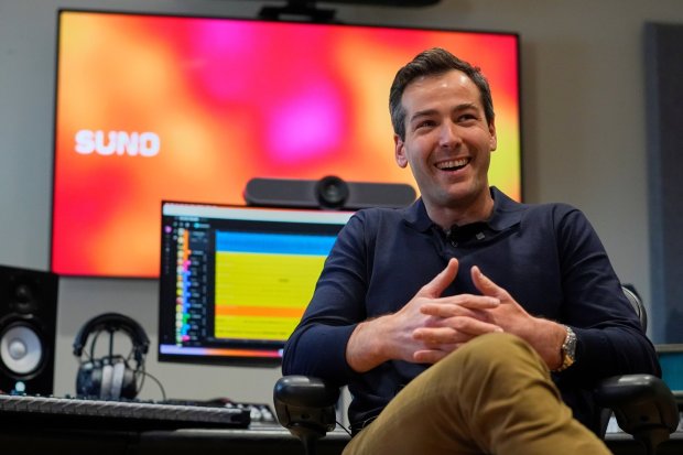 Mikey Shulman is one of the founders of the AI music generating platform Suno. He speaks to a reporter at company headquarters, Tuesday, Jan. 13, 2026, in Cambridge, Mass. (AP Photo/Robert F. Bukaty)