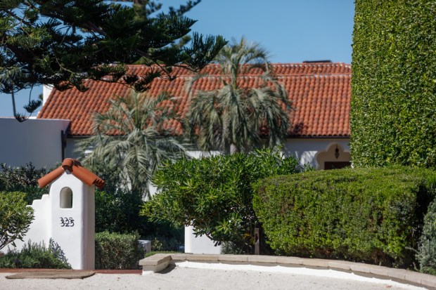 The gated entrance to three homes, including the 325 Dunemere Drive residence, in La Jolla on Wednesday, March 18, 2026. The Mills Act, enacted in 1972, allows historic property owners to receive tax relief by maintaining and restoring the property. (Kristian Carreon / The San Diego Union-Tribune)