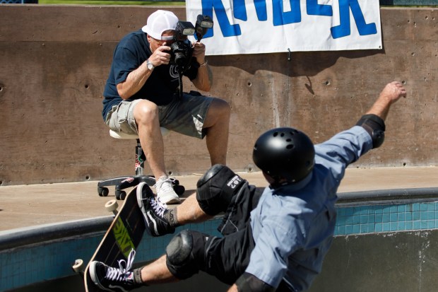 Photographer Lance Smith, 75, shoots a skater at Poods Skatepark in Encinitas on Saturday, March 7, 2026. (Kristian Carreon / The San Diego Union-Tribune)