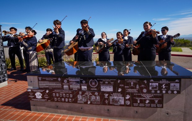 SAN DIEGO, CA - FEBRUARY 28: Members of Mariachi Aguila de Logan, perform during the veteran honor ceremony and plaque presentation at Mt. Soledad National Veterans Memorial in La Jolla, Saturday, February 28, 2026, in San Diego, California, for Army nurse, Captain Jennifer Moreno, a San Diego High School graduate, killed in 2013, while supporting combat operations when providing medical assistance to wounded soldiers in Afghanistan. (Howard Lipin / For The San Diego Union-Tribune)