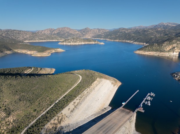 Fishing boats and kayakers take advantage of being out on the water at San Vicente Reservoir on Monday, Jan. 19, 2026, in Lakeside. (Nelvin C. Cepeda / The San Diego Union-Tribune)