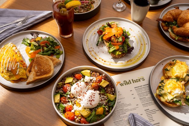 Meyer lemon Benedict, a quinoa breakfast power bowl and other brunch options available at Wild Hare Bar Garden for Easter Brunch. (Gabe Halvor)