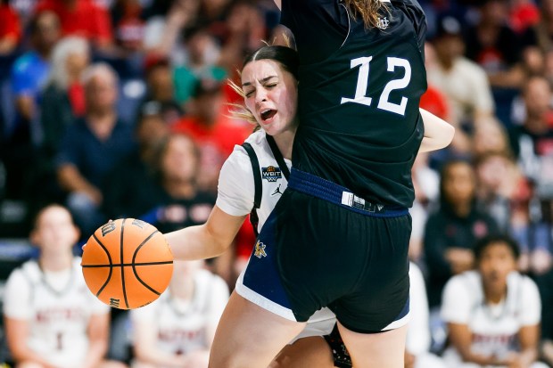 Nat Martinez #10 of San Diego State collides with Shirel Nahum #12 of UC Irvine during the first round of the WBIT at Jenny Craig Pavilion on Thursday, March 19, 2026 in San Diego, California. (Meg McLaughlin / The San Diego Union-Tribune)