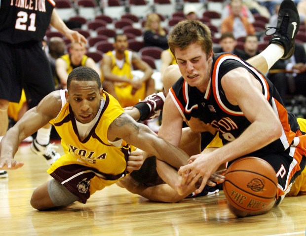 Loyola of Chicago's J.R. Blount, left, and Princeton's Michael Strittmatter, right, chase after a loose ball during the second half of a BCA Classic basketball game Friday, Nov. 10, 2006, in Columbus, Ohio. (AP Photo/Terry Gilliam)