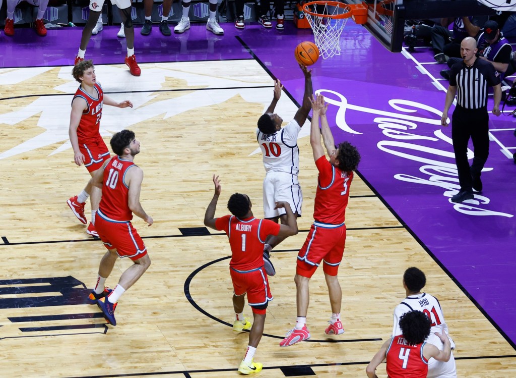 BJ Davis' heroics push Aztecs past New Mexico and into Mountain West final