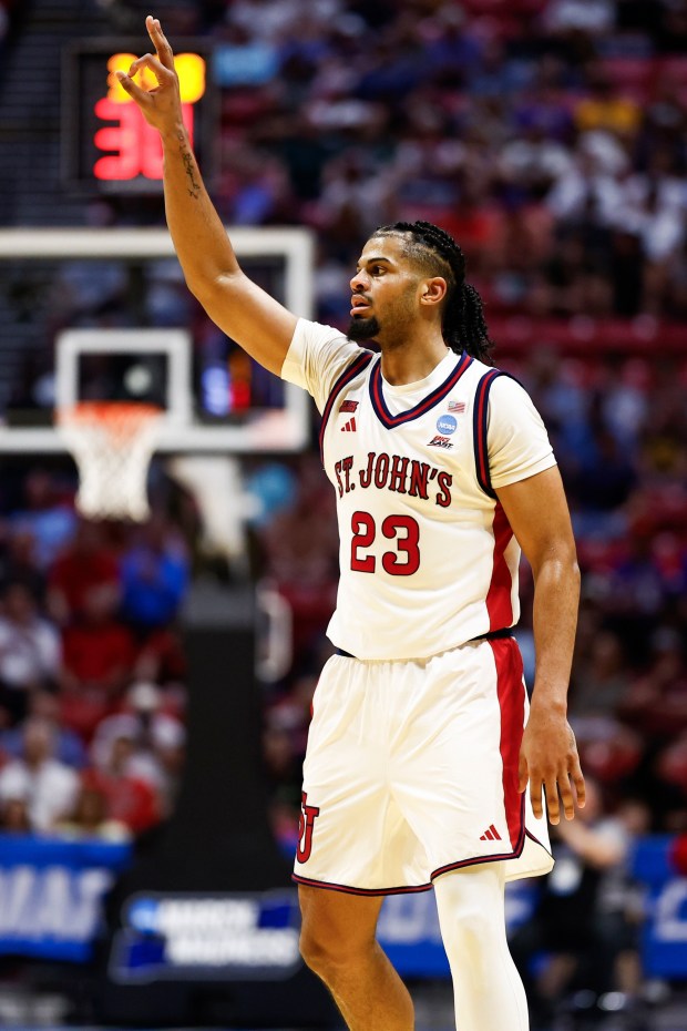 Bryce Hopkins #23 of St. John's celebrates after a three-point basket against UNI during the first round of the 2026 NCAA Men's Basketball Tournament at Viejas Arena on Friday, March 20, 2026 in San Diego, California. (Meg McLaughlin / The San Diego Union-Tribune)