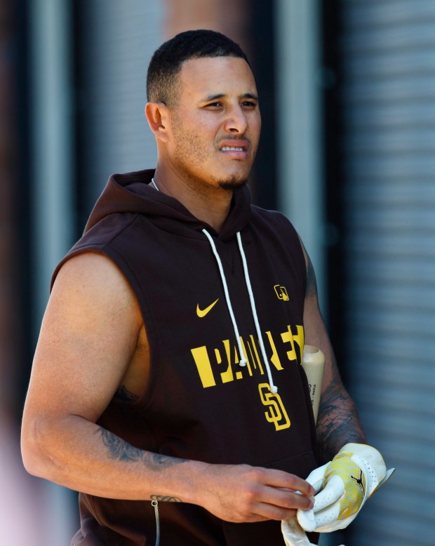 Peoria, AZ - February 19: Manny Machado #13 of the San Diego Padres looks on during a spring training practice on February 19, 2026 in Peoria, AZ. (K.C. Alfred / The San Diego Union-Tribune)