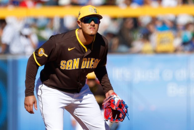 Peoria, AZ - February 22: Manny Machado #13 of the San Diego Padres plays third base during a spring training game against the Los Angeles Dodgers on February 22, 2026 in Peoria, AZ. (K.C. Alfred / The San Diego Union-Tribune)