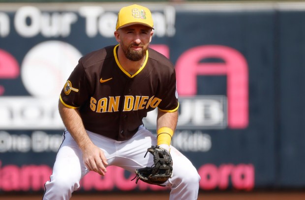 Peoria, AZ - February 23: Mason McCoy #18 of the San Diego Padres plays shortstop during a spring training game against the Milwaukee Brewers on February 23, 2026 in Peoria, AZ. (K.C. Alfred / The San Diego Union-Tribune)