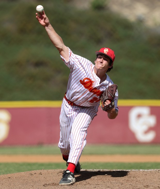 Cathedral Catholic's Kaden Kuhn delivers a pitch to Granite Hills in the first inning at Cathedral Catholic High School in San Diego on Friday, March 13, 2026. (Hayne Palmour IV / For The San Diego Union-Tribune)