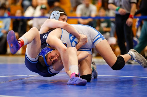 Rancho Bernardo's Mary Snider wrestles Granite Hills Savanna Gomez during their 155-pound match at Rancho Bernardo High School on Saturday, Feb. 7, 2026 in San Diego, California. (Meg McLaughlin / The San Diego Union-Tribune)