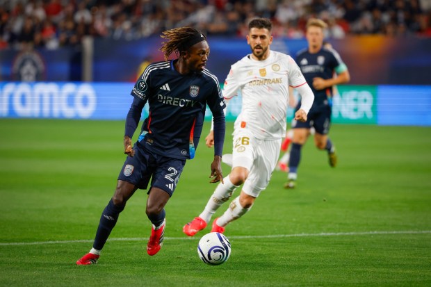 Manu Duah #26 of San Diego FC moves the ball against Paulinho #26 of Toluca at Snapdragon Stadium on March 11, 2026 in San Diego, California. (Photo by Meg McLaughlin/Getty Images)