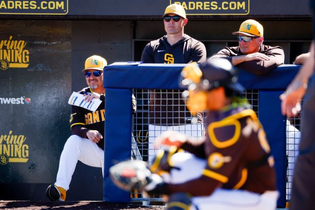 Ruben Niebla and Craig Stammen of the San Diego Padres look on during their spring training game against Great Britain at Peoria Sports Complex on Wednesday, March 4, 2026 in Peoria, Ariz. (Meg McLaughlin / The San Diego Union-Tribune)