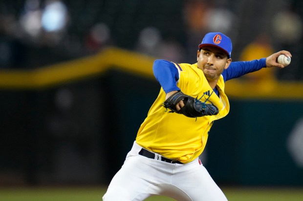 Colombia pitcher Rio Gomez throws against Canada during the sixth inning of a World Baseball Classic game in Phoenix, Tuesday, March 14, 2023. (AP Photo/Godofredo A. VÃ¡squez)